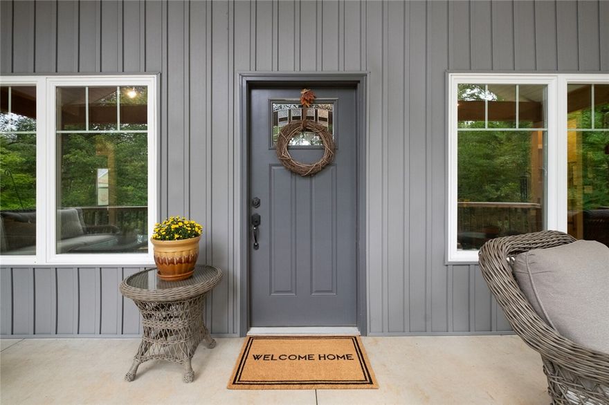 Welcome to the Hodge Lodge- where your homestead dreams become reality.  You will love the private 5-acre nature setting of this 2020 home.  Sit on the front porch with your coffee and watch the hummingbirds, deer and the rest of nature come to life.  After a day of foraging for wild morels & blackberries (just to name a few) or front entry garden, take a relaxing soak in the primary's claw foot tub. Warm up this winter by the fireplace with a good book from the library built-ins. Meals are a breeze in the open kitchen with large island.  Step out back to the bird habitat for those fresh eggs.  For the young- or young at heart, take a tree covered stroll to the fairytale tree house with climbing wall.  Shop is perfect for your next project or added storage, though the oversized garage provides plenty of extra space.  For security you will love the peace of mind with the built-in storm shelter and generator hook up.  All wrapped in this nature loving home.  Only 15 minutes from I49.  Come and see!