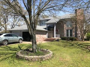 Custom 2 story home built with the executive in mind. This quality home features so many amenities like 3 bedrooms , office area and a beautiful sunroom which has windows all around and skylights for the natural light to pour in . All cabinets are custom made solid oak.Formal dining room off of the living area. The living area features 20 ft ceilings with custom windows and a wood burning fire place for those cold winter evenings. A large deck perfect for entertaining on those summer evenings. All of this sitting on a 7.01 ac parcel of land with breath taking views. New CH&A seer 20 with smart tech controls.