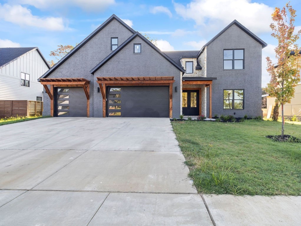 Another beautiful home in Autumn Hills! Main level features an open Kitchen with quartz counters, pantry, coffee bar, and eat-in Dining. Large Great Room spills out onto the covered porch. Sizeable office, half bath, laundry and mudroom. Master Ensuite with soaker tub, custom tiled shower. Extensive interior metal and woodwork gives a Modern Farmhouse feel (see last photo for details). Second floor landing overlooks the Great Room and leads you to bedrooms 2, 3, and 4 plus two full baths and a Bonus room. Three car garage. Landscaped and sodded.