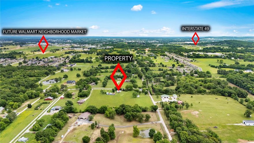 Exceptional opportunity to own approximately 5.95 acres in a highly strategic Northwest Arkansas location with incredible accessibility to major amenities, growth corridors, and employment hubs. While the property currently includes a home, the value is being offered in the land itself—making this an ideal opportunity for future development, investment, or a custom estate setting. Conveniently located just 3 minutes from the new Lowell Neighborhood Market, 10 minutes to the Pleasant Grove Walmart, 11 minutes to the Elm Springs Walmart, approximately 12 minutes to Northwest Arkansas National Airport, and only 17 minutes to Walmart Home Office. Enjoy the balance of privacy and usability with quick access to the continued growth and expansion happening throughout Northwest Arkansas. Rare acreage opportunities in this location are becoming increasingly difficult to find.