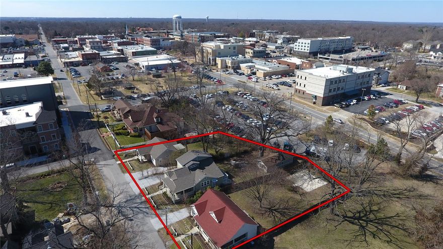 RARE FIND in Downtown Bentonville!! Just .1 mile to Tusk and Trotter and restaurants on the Square and surrounding. Perfect development location in the heart of all the activity! Currently used for rental properties. Perfect spot for so many opportunities. Be in the center of it all!!! Each cottage listed separately as residential - all 3 listed for $1,599,000 total. MLS #1156542, 1156545, 1156547. Zoned Downtown Core.