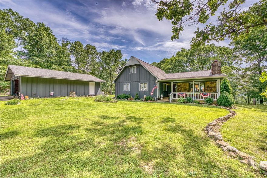 This is truly a once in a lifetime property! With over 197 absolutely gorgeous acres of lush mixed grass pasture, mature hardwood and cedar timber, rock outcroppings, boasting over 1,800 ft of Crooked Creek access, year round spring fed creek through the property, paved road frontage, large metal barn, shed, 3.000+ square ft, 5 bd, 3 ba home, Generac generator, and distant views This property located in the heart of the Ozarks with a short drive to the White River, Buffalo River and National Forest, Bull Shoals Lake, Table Rock Lake, and much more. If you miss this one there just isn't another like it!