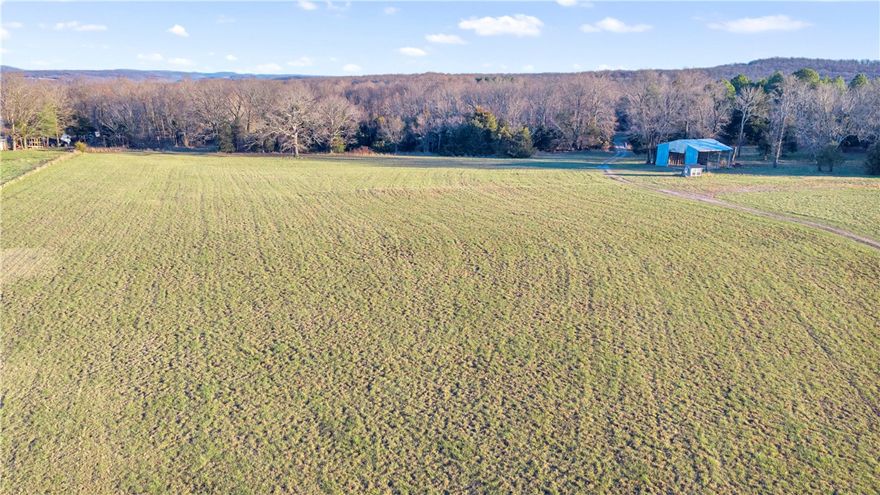 Discover just over 50 breathtaking acres minutes from downtown Kingston, AR, offering the perfect blend of privacy and convenience. This incredible property features two charming A-frame pods ideal for glamping with a potential for Airbnb rentals, creating an instant income or personal getaway opportunity. The land is easily accessible for RVs and campers, with electric already on site and rural water available at the dirt road. With minimal dirt road access and a location convenient to the Buffalo Wilderness Outdoor Center, this land is perfectly situated near hiking, sightseeing, and endless outdoor adventures. The property also offers excellent potential for hunting and wildlife recreation. Whether you're looking to expand a short-term rental business, build your dream retreat, or simply own a versatile piece of the Ozarks, this property is truly full of possibilities. Don't miss this rare opportunity to own a slice of Northwest Arkansas paradise!