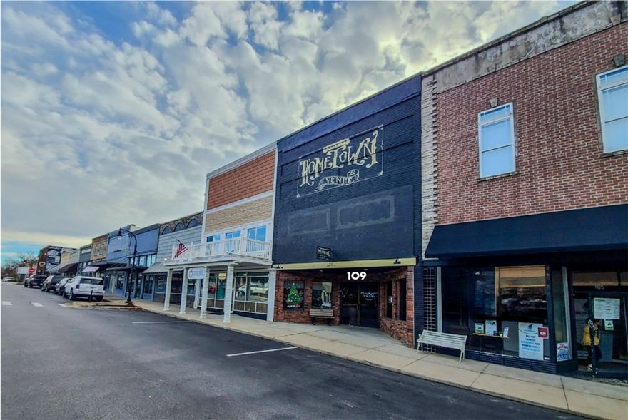Beautiful historic building in Downtown Gravette for sale/lease. Property features hardwood floors, bar with granite top, 3-compartment sink, retail windows w/ display wells, mezzanine, spiral staircase, renovated bathrooms, & full walk out basement for storage. Upstairs currently used for entertainment and has oversized his & hers lounge rooms with updated private bathroom. 

Located in the heart of Downtown Gravette.

20 ft ceilings with original tin.

Property features balcony and hardwood floors throughout.

Ideal for office/retail/restaurant, wedding/event venue.

Versatile layout for various concepts.