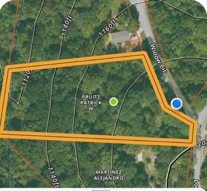 +/-2.77 acres of a park-like setting in desirable Wedington Woods with mature Pine trees. Ample space to build your dream home or for residential development. There is a dilapidated single-wide mobile home on the property, along with an outbuilding. Septic, propane, and utilities are present.