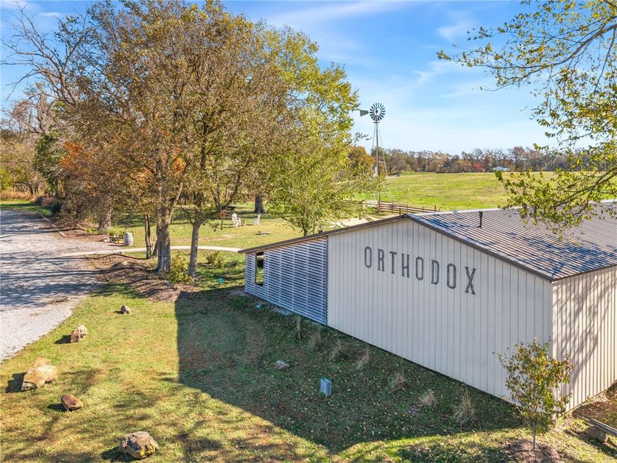 Seize the opportunity to own Orthodox Farmhouse Brewery, a unique & thriving business nestled in the heart of the Ozarks. This fully operational brewery & taproom, built on excellent craftsmanship, is now available for purchase. Whether you're an aspiring brewery owner or a seasoned entrepreneur, this is your chance to take the reins of a growing business w/ a devoted following. Orthodox Farmhouse Brewery has earned a reputation for producing exceptional beers, crafted w/ a true passion for quality. The brewery has a loyal customer base, a thriving taproom & an ever-growing presence in local restaurants and bars. This is a turnkey opportunity – everything you need to continue the tradition of excellence that is already in place, or build something new of your own.
The property also features a 3 bedroom, 2 bath farmhouse, offering charming living quarters for the owners or as a potential additional revenue stream as a rental property. New Septic in '22, New Roof '26, shed, chicken coop, garden beds, & fruit trees.