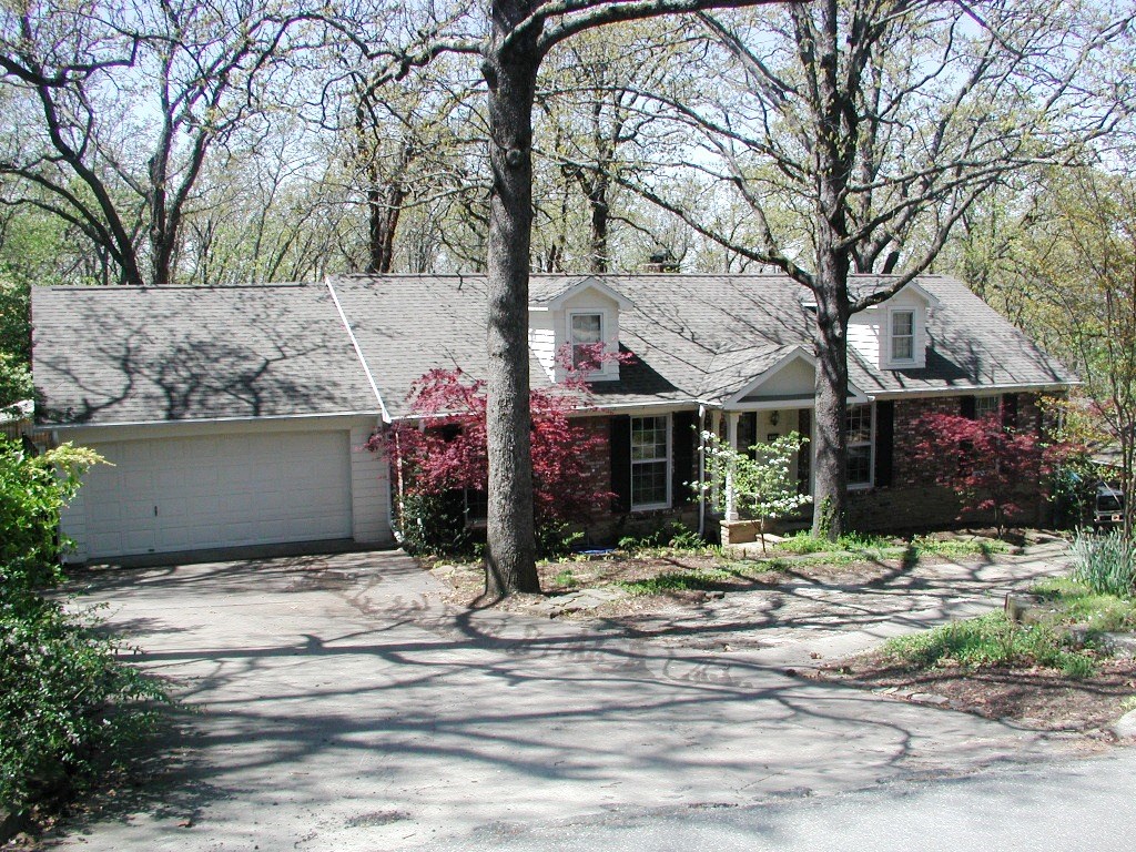 Park like setting on almost a 1/2 acre lot featuring waterfall and Koi pond. This newly remodeled 4br/3ba home has never been on the market. Amenities include refinished hardwoods, new carpet and paint, updated kitchen with double oven, and 3 bathrooms completely renovated. Garage has small room for workshop and has adjacent greenhouse attached. Back deck offer gorgeous views. Perfect location with lots of charm and curb appeal.