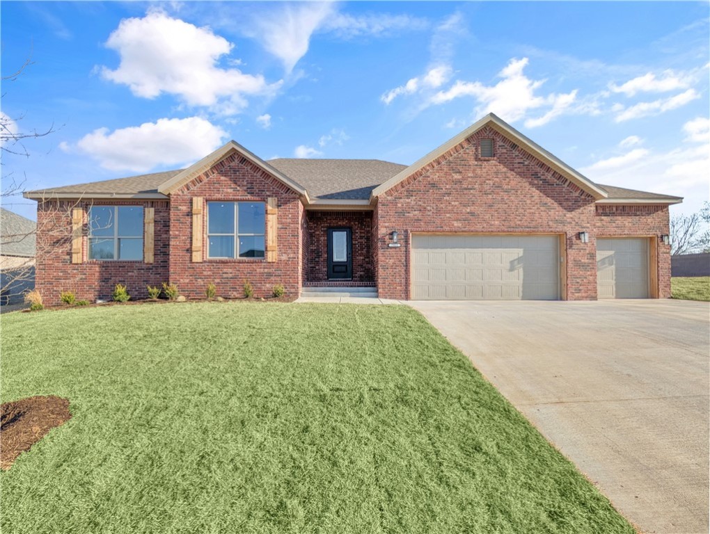 Welcome To Your Next Home! Up to $4,500 Preferred Lender Credit! Welcome To The Brand New Spring Creek Farms Springdale/Lowell/Cave Springs. Excellent Location That Just Cant Be Beat, Situated Just A Few Miles South Of Cave Springs And Offering Future Amenities Such As Pool, Playground, Walking Trails Coming In Phase 3. This 4 Bedroom, 3 Car Garage Home Is A Popular Plan That Offers A Spacious Main Area Living w/ Vaulted Ceiling And Fireplace. Kitchen Will Feature Island w/ Bar Seating, Pantry, Under Cab Lighting, Tile Backsplash, Eat-in Dining. Primary Suite w/ Dual Vanity, Soaker Tub, Full Custom Tile Shower, Dual Walk-in Closets. Split Floorplan. 3 Secondary Beds + Full Hall Bath. Nice Covered Back Patio. Fully Fenced Yard. Reach Out Today And Lets Get You Moving!