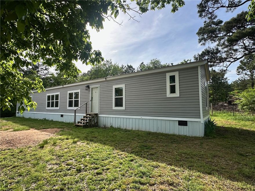 Discover peaceful country living in this beautifully maintained manufactured home situated on approximately 1.28 acres of open space atop Lutherville Mtn. This modern move-in ready home offers the perfect blend of comfort and convenience, with a spacious layout! This 3 bedroom, 2 bath home has bright and airy interiors, an open-concept kitchen and living area, a separate laundry room, and large bedrooms. This property is fully fenced with a gated entrance, a 40x30, 3 stall pole barn, a 10x8 metal shed for storage, and a new chicken coop with a fully fenced area. Whether you're looking for a starter home, downsizing, or a private retreat, this property has it all! Just minutes from town. Call today to schedule a showing!