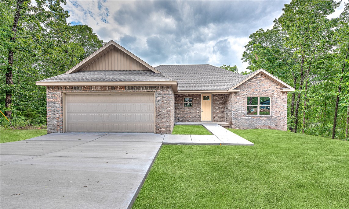 New Home Just about ready to move in, The Builder is putting the finishing touches on this home. You will love the open floor plan and all the windows. Features in this home include-Gas Log Fireplace, wood tile Floors, Quartz Countertops, LED Can lights in all rooms, Built in Lockers by Garage door, and tile shower in master bath. You don't want to miss a chance to look at this home