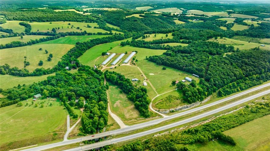 CREATE YOUR OWN DREAMS; this lovely 28 ac mol has what most people dream of in a lifetime! Located in the heart of Springdale/Hindsville, with views, a well maintained double wide, with old turkey houses (which can be arranged to be removed with negotiated contract), has well, very secluded, yet off the highway close to all things NWA has to offer! Whether you wish to build new, live in the DW while building or buy the land without the mobile (up for discussion), let's find your dream here! CALL TODAY! see also mls 1330292