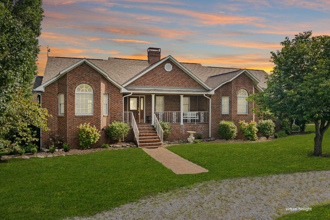 This home is nestled on 18-acres, this all-brick 3 bedroom, 3 bathroom home offers a perfect blend of comfort and countryside charm. Ideal for those seeking a serene retreat with ample space for animals or just have a private retreat. The spacious interior features a welcoming layout with three bedrooms and 2 full bathrooms on the main floor. A basement with an additional bathroom adds versatility, perfect for extra living space or storage needs. Enjoy breathtaking views from every angle showcasing the beauty of the surrounding landscape. Outdoor enthusiasts will appreciate the expansive acreage, providing endless opportunities for outdoor activities and gardening. A shop building is included, offering space for hobbies, storage, or additional workspace.