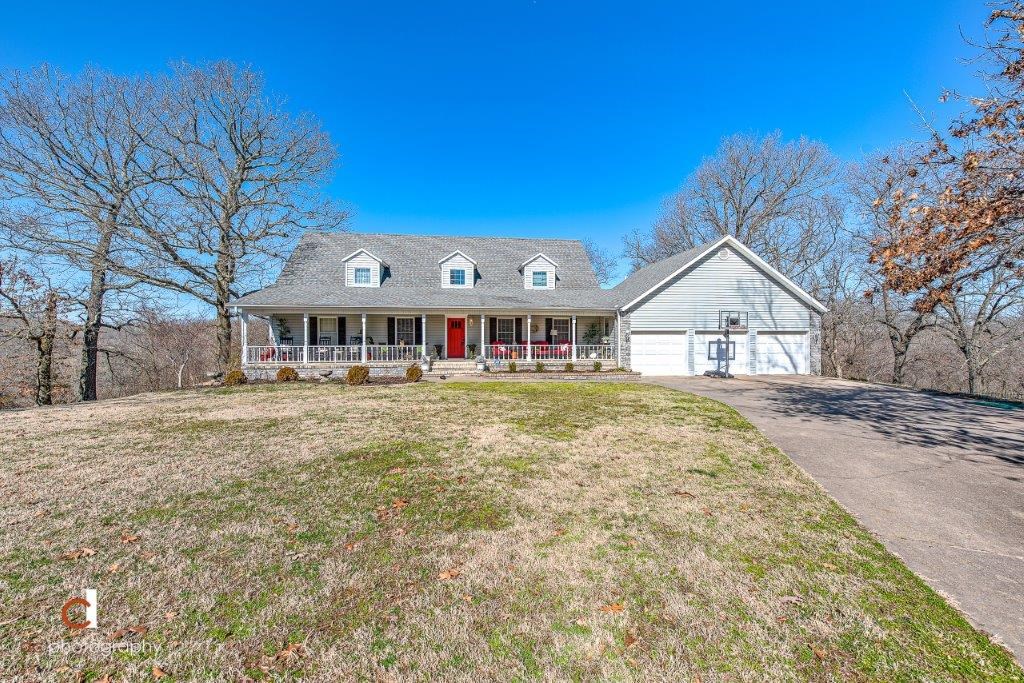 BEAUTIFUL AND PRIVATE 5 ACRE SETTING AT THE END OF A CUL-DE-SAC WITH SPACIOUS AND PRIVATE BACKYARD FEATURING IN GROUND HEATED POOL, DECK AND FIREPIT IDEAL FOR ENTERTAINING! Close to EVERYTHING Bentonville has to offer…3 miles to Crystal Bridges, 4 miles to Downtown Bentonville and close access to I-49! Beautiful 2 level interior features new bamboo flooring, new paint, private study, media room, large living room w/ fireplace, large eat-in kitchen w/ stainless appliances, 2 master suites and 2 additional guest bedrooms w/ shared bath. Large newly extended deck walks out to the pool and firepit area! Extra storage under house! Looking for privacy that is close to all the action….this is it!
