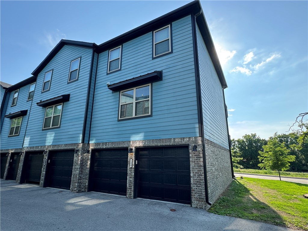 Move in ready! 3 bed, 2 1/2 bath, 2 car garage and additional parking space in lot! Stainless Steel appliances in the kitchen. Refrigerator, Washer & Dryer are included with unit! Centrally located townhome in Fayetteville, AR and just minutes from everything. Take the bus to the U of A or walk down the road to a local coffee shop. Owner is offering fully furnished townhome as a short term rental option through July 31st.