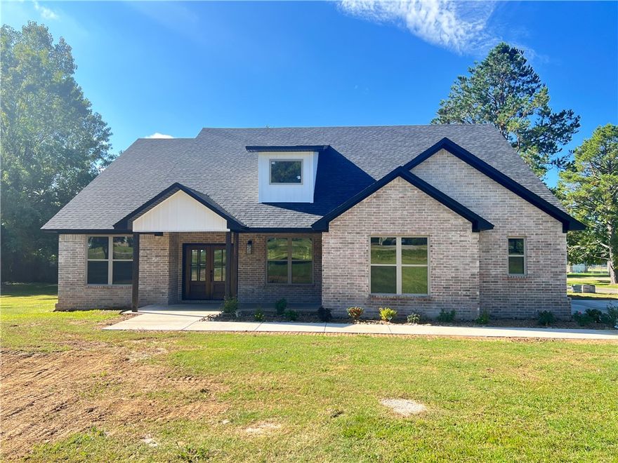 This is a quality built new construction in Dardanelle.  4 bdrm., 2 bath, double garage on an acre