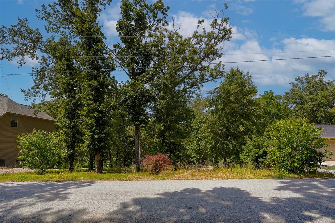 .30 Acre lot, that is partially wooded with sewer at the street, close to main roads and minutes away from shopping. Great building potential.