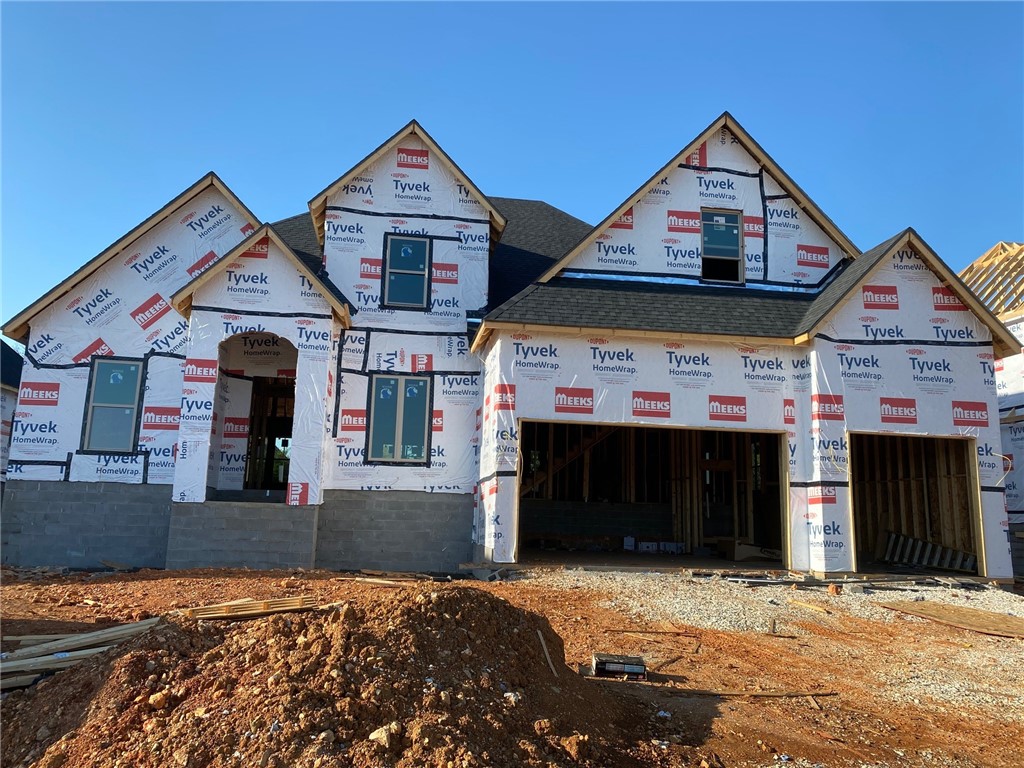 Welcome to Clarendon Heights! Perfect location in SW Bentonville. This Waters Plan features 4 Bedrooms (2 on lower level & 2 on upper level) & 4.5 baths. Study (w/ closet which can be 5th BR), formal dining & large eat in kitchen. Great open plan! Kitchen features center island, double ovens, vented hood, gas burner stove, pantry, & more. Huge bonus/media room. Upgrades include epoxy floors in garage, central vac, security system, sprinkler system, ceiling high kitchen cabinets, outdoor fireplace, 10' ceilings (main level), 2-50 gallon water heaters w/ circulation pump, stainless sink in laundry, & more! Standards List, Plat, Selections List, & other Floor Plans upon request. Other lots available for pre-builds! Info packet upon request.