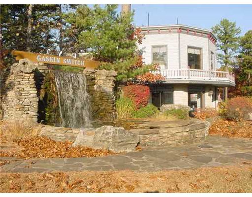 Well established shopping center with 9 shops surrounded by motels, restaurants and other businesses within walking distance. Busy highway location.,Approx. 6,000 sq. ft. of storage. 24 Hour notice for showings. SPECIAL CONITIONS OF LISTING. Seller to receive acceptable financial information from any buyers before releasing P/L Information. Subject to Seller occupying lower level of building for 6 months after closing.