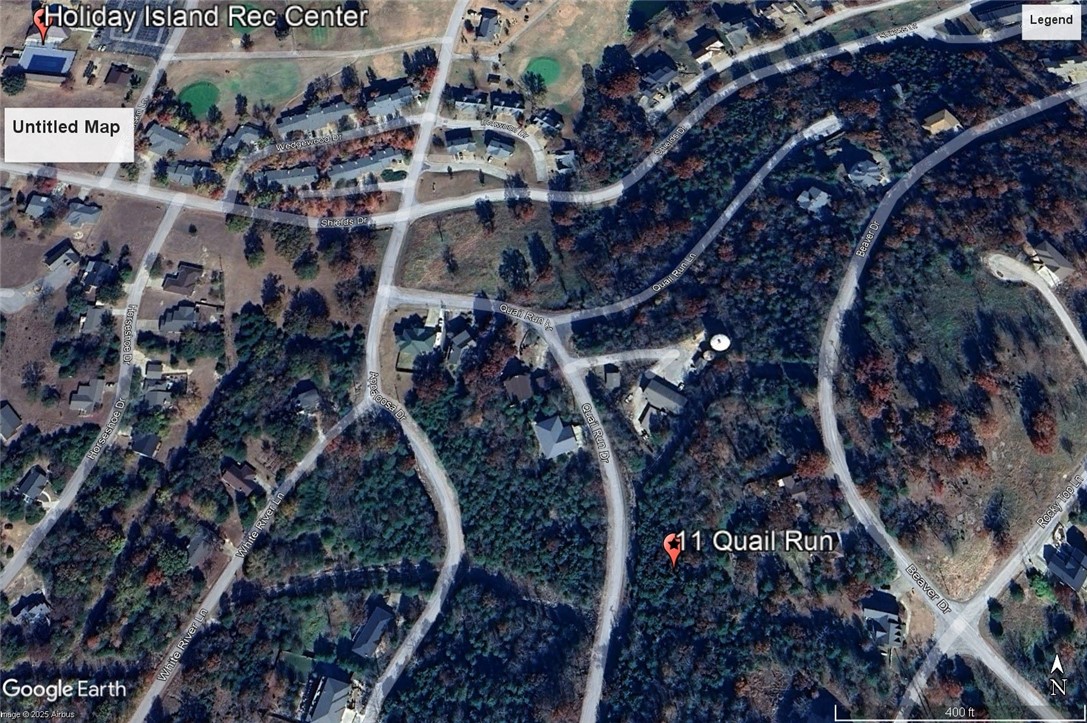 Ready to build your dream home? Quiet and gently wooded within a neighborhood, this elevated lot offers the best of both worlds. Within walking distance of the Recreation Center. Enjoy the amenities in Holiday Island like golf courses, a country club, swimming, tennis and a marina with a fishing dock or watch the local fauna from your front porch! Nearby Eureka Springs or Rogers offers great shopping and vibrant cultural hubs.