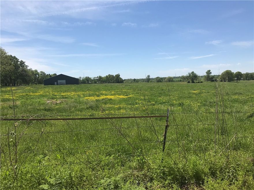 A Stones throw from the new Bentonville West High School....32.36 acres perfect for development. Seller willing to entertain dividing.
