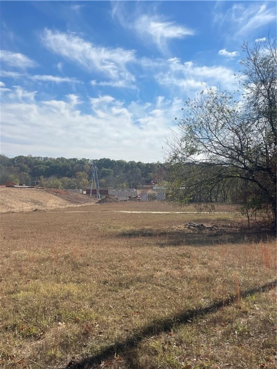 Great opportunity to own 3.89 +/- acres in Elm Springs. Convenient to AR 612  Interchange. Springdale Water on South side of Brush Creek Rd. Property has a 100' easment for electric.