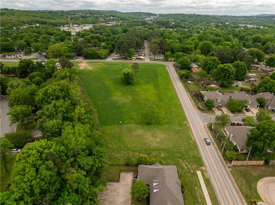 Located between College Ave and Greg Ave and just south of Washington Regional Medical Center, this .49 property is zoned R-O Residential-Office. Great retail, medical, or office space location. Residential Office District is designed primarily to provide area for offices without limitation to the nature or size of the office, together with community facilities, restaurants and compatible residential uses. The intent of this district is to allow administrative approval if the developer decides to use urban form, in compliance with the build-to zone and minimum buildable street frontage.