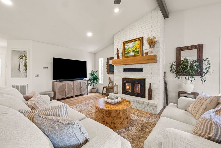 Tucked in Dunvegan near Loch Lomond, this refreshed single-level home is truly move-in ready. You’ll love the open, light-filled layout with updated LVP flooring, quartz counters, modern fixtures, and a gas-log fireplace anchoring the main living area. The split bedroom design gives the private main suite a tiled walk-in shower, dual sinks, and walk-in closet, while two additional rooms, one can be used as ate a flexible guest/office wing. A bright sunroom adds extra space for an office, workout area, or second living space overlooking a rare flat backyard that actually works for pets, play, gardening, or a firepit. Outside you’ll find an attached 2-car garage, extra gravel parking for guests, a boat, or trailer, and easy curb appeal. Minutes to Hwy 71, Tunnel Vision and Lago Vista MTB trails, lakes, golf, pools, and Bella Vista club amenities—ideal for soaking up the NWA lifestyle year-round.