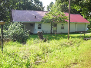 BEAUTIFUL SETTING AT END OF LANE, complete privacy, and gorgeous view off back deck. Also includes rock fireplace, retro built ins, lots of storage, barn, pond, and park-like yard just down road from popluar Cliff House Restaurant.