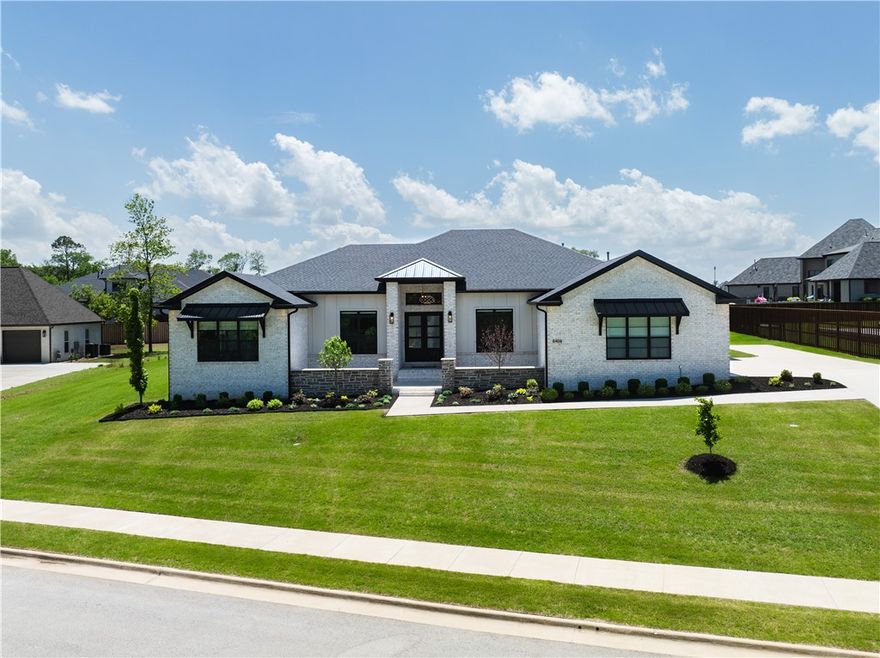 Welcome to your Scissortail dream home! This one-story custom-built estate sits on a 0.6 acre lot begging for a pool.   Step inside to discover 3705 square feet of meticulously crafted living space, featuring 4 bedrooms and 4.5 bathrooms, ensuring room for both relaxation and entertaining. You'll find a kitchen with ample counter space, a GE cafe 8 burner range, a coffee nook, and a walk-in pantry.  The primary suite includes an office nook, and an elegant bathroom with a steam shower. The additional bedroom have  ensuite bathrooms, one including a walk-in shower, and a powder room is located right behind the open living space.  Walk outside and find a gas fireplace, two porches, and a spacious lot to create your outdoor oasis. Incredible upgraded features of this home include: allergin air system, indoor storm shelter, built-in refrigerator, Venetian plaster fireplace, outdoor gas fireplace, screened-in porch, and a security system with cameras. Don't wait, this home is too perfect to pass up!