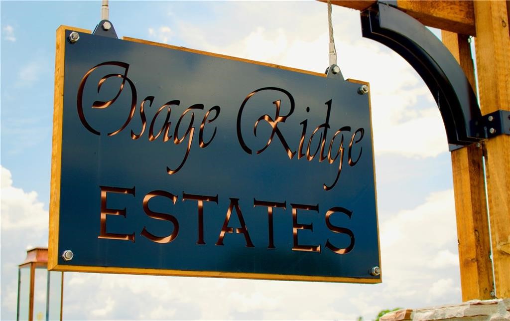 The 5.58-acre level lot in Osage Ridge Estates is a rare opportunity for someone looking to build their dream home. The lot is located within a gated community, providing an added level of security and privacy. The community is within the Bentonville School District, which is known for its excellent education system and highly-regarded schools. This is an ideal location for families or individuals who value a peaceful, serene, and secure environment while still having access to all the amenities and facilities of a bustling city. The level terrain of the lot makes it easier to build on and provides more options for landscaping and outdoor recreation. With its prime location, desirable school district, and ample space for building, this lot is a once-in-a-lifetime opportunity for anyone looking to build their dream home.
