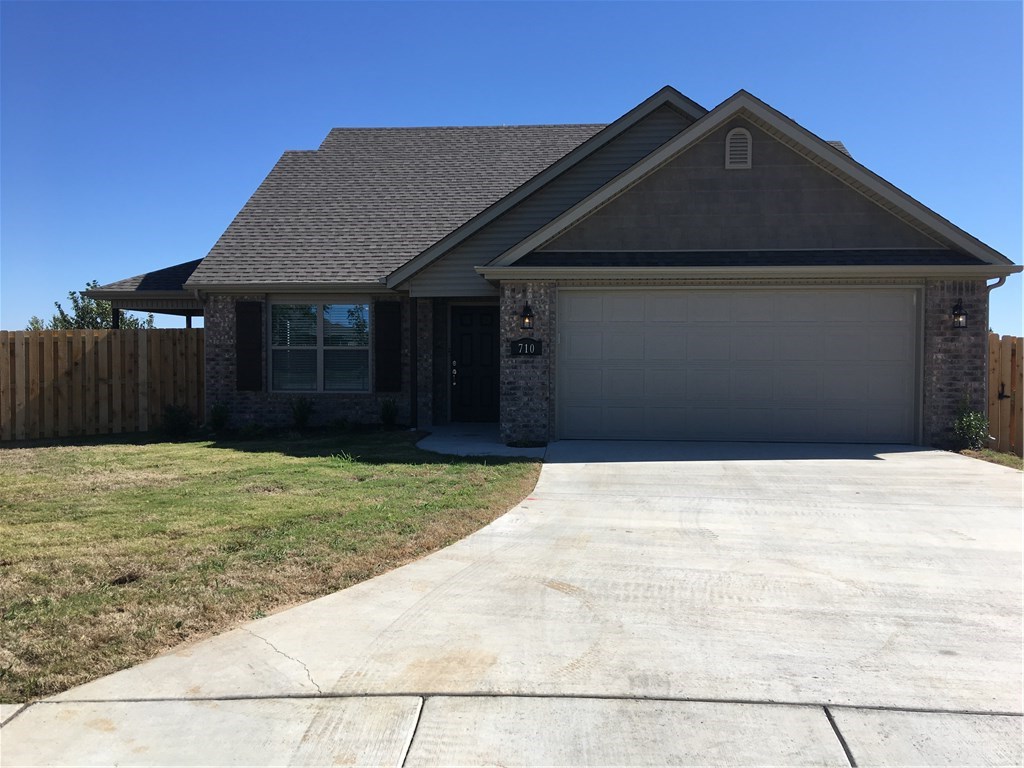 New 3 Bedroom 2 story home MOVE IN READY!! 2 full baths built by Riverwood Homes. Wood floors in lg Living room w/corner gas fireplace & access to covered patio. Great Kit w/island &granite counter tops, pantry, dining area. Nice mst bedroom & mst bath w/whirlpool tub & shower, walk in closet-2 bedrooms upstairs & a full bath. Blinds & gutters-2 car garage w/ door opener, key pad entry & pull down attic storage, sodded front & back yard- Front Privacy Fence- Seller will pay $2,500 of buyers closing costs.