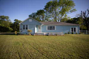 3 bedroom 2 bath home on a large city lot with a detached large shop, back and front deck, above ground pool and huge master suite, kitchen and living room! Home has the original hardwood floors that have been restored!
