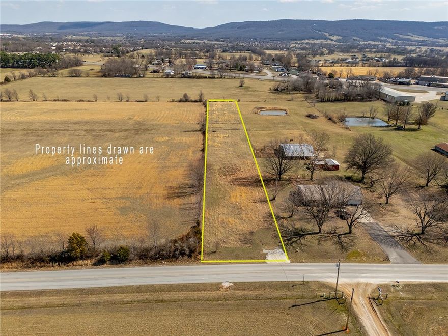 **Public Real Estate Auction to be held Thursday, June 26th at 10:00AM** Auction will start at 10am. 
Excellent location off Little Elm just outside of town. 1.69 level Acres with a culvert driveway entrance. 
Dimensions are 90’x 833’. Available utilities include an existing water tap, approved septic, electric at 
the street and gas on-site. Land is on a paved road in an area of homes on large lots. Multiple building 
sites makes this an ideal location for your dream home. Less than 4 miles to either Farmington or 
Prairie Grove Schools. Short drive to shopping and restaurants. Reserve auction.  10% non-refundable deposit is due on the day of the auction. 10% buyer's premium at 
closing. See website for terms & conditions. All buyers are encouraged to view the property early and 
conduct any inspections prior to the auction.