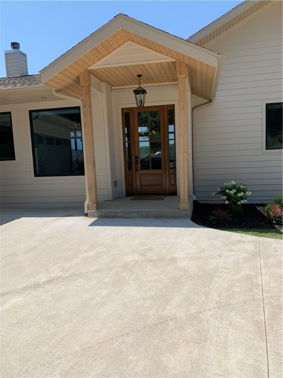 Fantastic southwest view of Beaver lake around Fords Creek and Point 8. Open floor plan on main level with kitchen and living area. Primary bedroom and bath on main level, as well as a guest bedroom and bathroom. Two bedrooms and bathrooms in lower level. Green house and garden area adjacent to the home. Private 2 slip dock with swim deck.