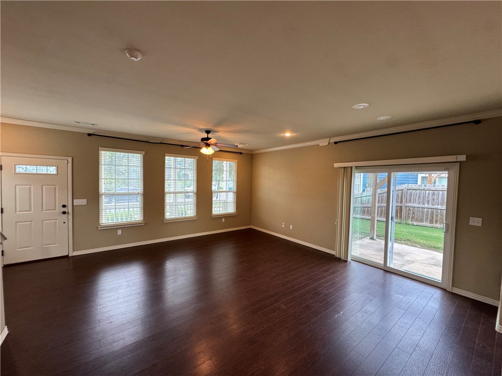 Stylish row home in the sought-after Rupple Row Subdivision of West Fayetteville! This 4-bedroom, 4-bath residence offers an inviting open floor plan with a modern urban design. Enjoy the charm of a welcoming front porch, a private side patio, and a two-car garage for convenience. The layout is ideal for a variety of living arrangements, featuring a main-level master suite and three additional bedrooms with two baths upstairs. All appliances are included—refrigerator, washer, and dryer—making it move-in ready