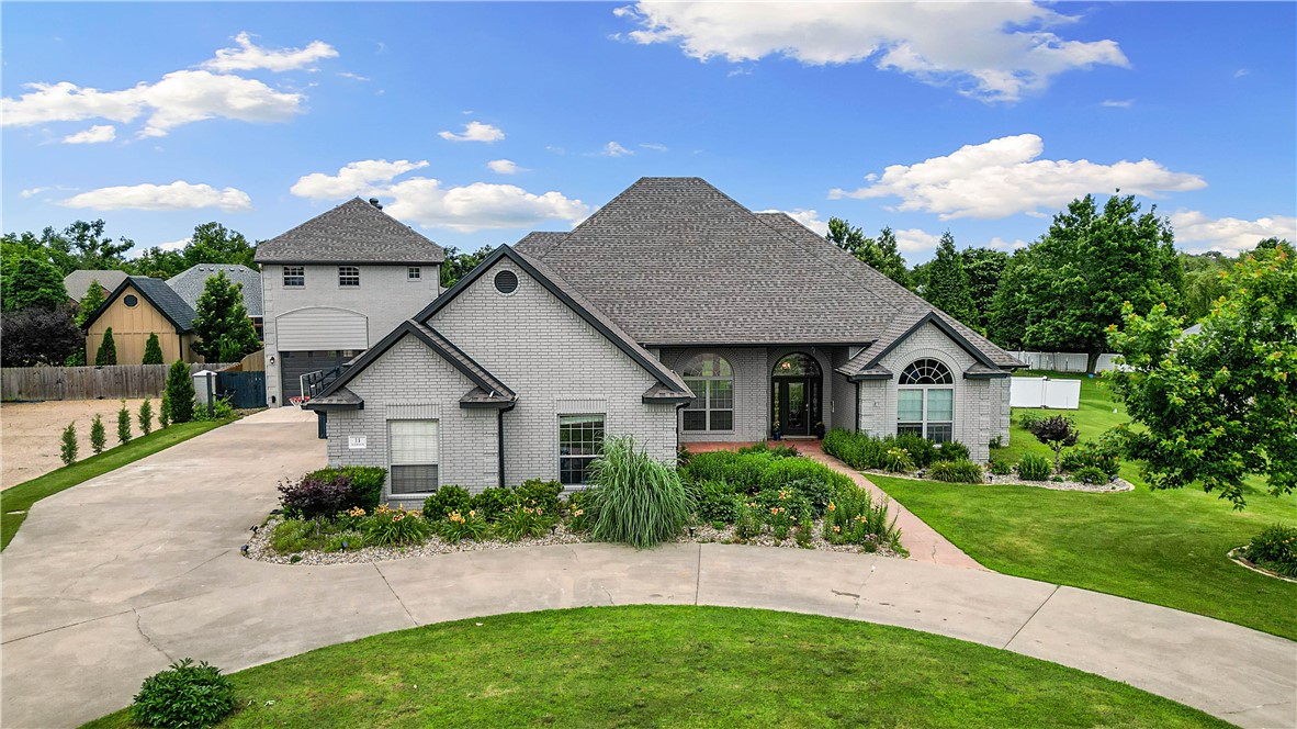 Check out this amazing Bentonville home in the sought after Glenbrook subdivision! This Location allows you easy access to I-49, Walmart HQ, Bentonville Square, Trail systems, Museums, Bentonville Schools, New School of Medicine, Orchard Park, Memorial Park, and so many local favorites.This home has plenty of rooms and bathrooms, multiple living room/den options, dining space, and lots of upgrades! Don’t miss the newly added mixed use heated/cooled gym/bonus space which has tons of natural light, as well as a full bathroom and washer/dryer hookups. Also included is a custom loft attic space with storage and is insulated. Upstairs, you will see a full kitchen/dining room and 2 bedrooms plus a full bathroom. Think in-law quarters, apartment, office spaces, or guest bedrooms. This home sits on over half an acre and is a flat lot with organic herb gardens, flower gardens, and green space. New roof in 2024, along with new flooring, and several updates. It’s a great and rare find so close to the Bentonville Square!