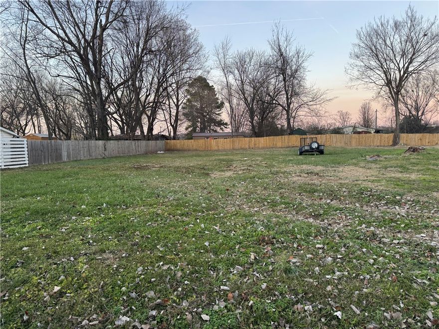 Level and cleared 0.25 acre lot (m/l-subject to new survey) located in an established neighborhood.  This property offers a convenient setting with nearby recreational amenities--skate park, Prairie Grove Battlefield Park, shopping in the downtown district with all the antiques shops and easy access to local schools.  This is an excellent opportunity for a future homesite or investment within a growing area.