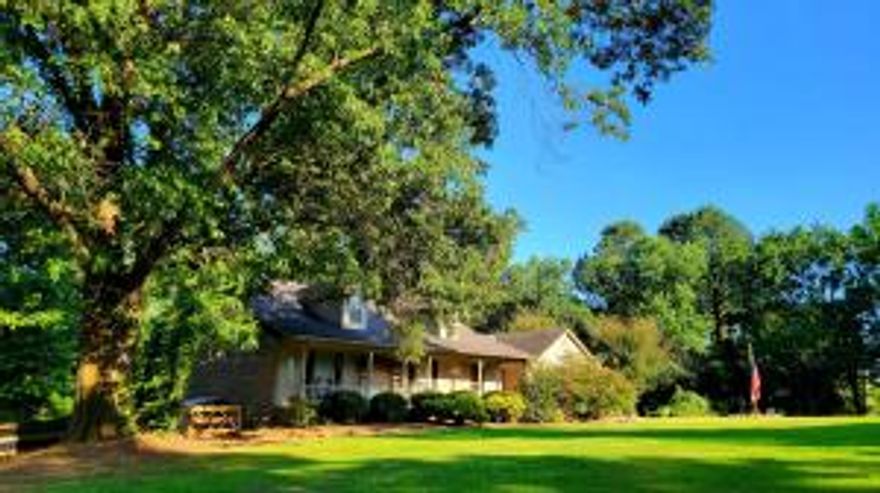 What an amazing property. 3 bedroom 3 bath brick home with large open living room a wood burning insert that is ducted through the house, a kitchen full of cabinet space, and a deck overlooking the pool, hot tub and the wonderful mature trees that can be found on the property. 7.6 acres fenced and ready for horses with a run in shed and tack room off the side. The salt water pool is 15 x 35 and is up to 6' deep and also offers a pool house for all of your pool accessories. There is a fenced area for the dogs and there is additional garage / shop area. Pond is stocked with bass, catfish and perch. High speed internet with Arkwest.