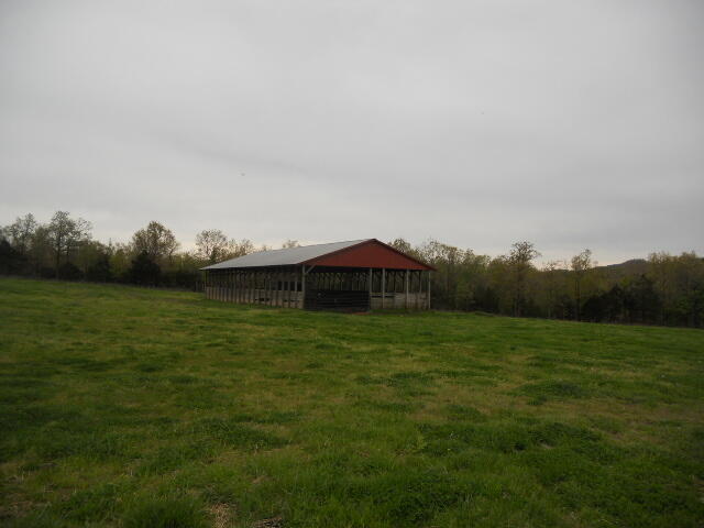 Looking for the perfect mixture of woods and pasture? High producing hayfields, nice mixture of timber ground, building sites with views, springs, pond, barns, rural water and electric. All this less than 1 mile from paved road.