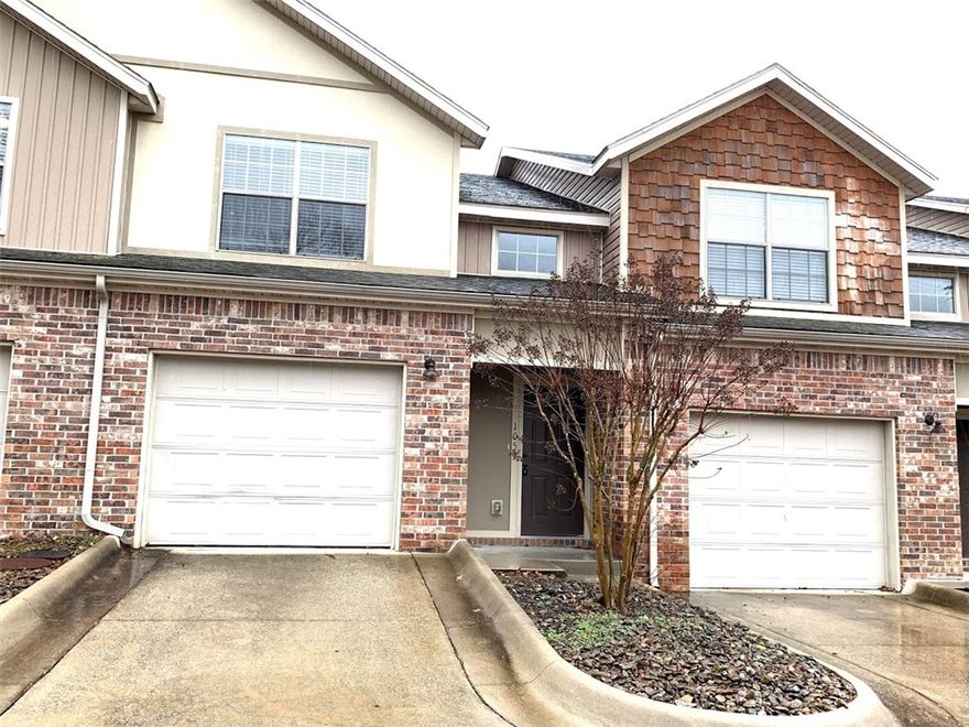 Fabulous 3 bedroom, 2.5 bath townhouse in a convenient Fayetteville location! Minutes from University of Arkansas, shopping, restaurants and more. Large, open living room with luxury vinyl plank flooring adjoins the great kitchen with oak cabinets, lots of cabinets and drawers, counter space and island. Full-size refrigerator, range, dishwasher and microwave. All bedrooms are upstairs and each have ceiling fans and carpet. Large master bedroom has vaulted ceiling and private bath (shower/tub combo). Full size washer and dryer are conveniently located just outside the bedrooms. Unit includes a one-car garage and additional exterior parking. Tenant occupied until 8/31/22.