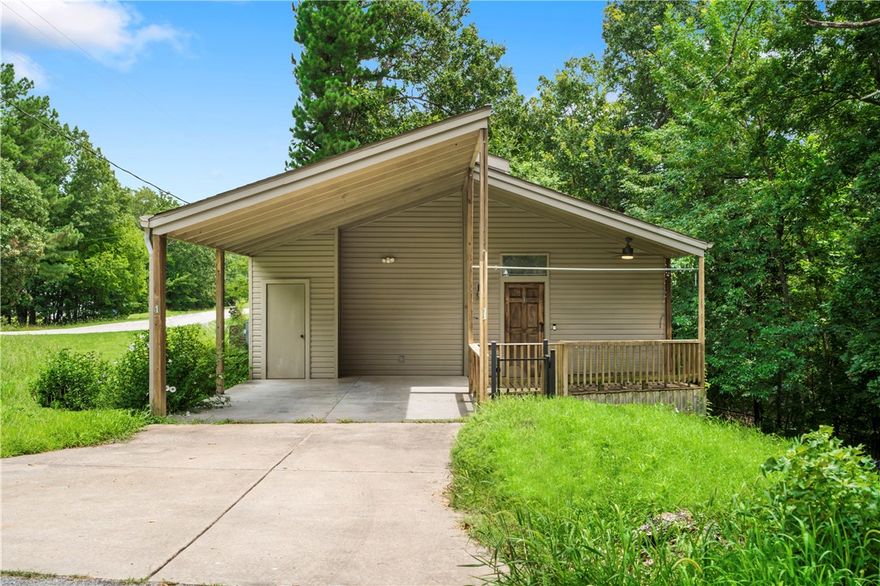 Tucked into the trees just minutes from Bentonville, this charming Bella Vista home is a fully furnished, operational Airbnb with vaulted ceilings, exposed beams, and a peaceful covered front porch. It’s located near Lake Windsor and Lake Ann, with access to Bella Vista’s seven lakes, golf courses, fitness centers, and an expansive trail system. Inside, you’ll find two well-appointed bedrooms, updated bathrooms, and generous storage throughout. With quick access to outdoor recreation and modern amenities, it’s the perfect blend of nature, comfort, and income potential.