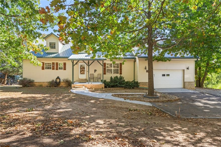 Discover the perfect blend of comfort & functionality in this spacious 4 BR, 2 BA & 2 partial BA home offering over 2,276 sq. ft of living space. When you step inside, you'll appreciate the rich hardwood floors & thoughtfully designed layout. The primary BR includes a large walk-in closet & private access to one of the best mountain views in the area - Boat Mountain makes a stunning backdrop for your evening wind-down. The heart of the home boasts a sizable walk-in pantry. You'll love the upgraded HVAC system and new furnace/air handler installed to keep you cozy year-round. A hidden gem of this house is the poured concrete basement, home to a large workshop perfect for weekend projects or hobbies. Safe room gives you peace of mind. An additional BR and half BA were added in 2022, bringing extra comfort and space when guests drop by. Upstairs, the unfinished floor space offers endless potential: home theater, art studio, or craft room. Home offers central vacuum, satellite, and oversized garage. All #'s are approx.