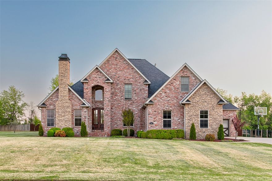 Welcome to this stunning executive-style home, perfectly situated on a generous lot in a highly sought-after neighborhood. An inviting 2-story foyer leads to the living room w/ vaulted ceilings, fireplace & custom entertainment center. The updated gourmet kitchen features a 48-inch built-in refrigerator, a built-in ice maker & beautiful waterfall island. The primary suite is a true retreat with a tiled shower, soaking tub, & ultra-custom walk-in closet that leads to a private patio. Step outside to a backyard oasis featuring a stunning heated pool w/ Ecosmarte system. This home also includes a home theater room, bonus room, office/den w/ fireplace & built-in bookshelves, formal dining room, security system, central vac, & sprinkler system. All showers in the home are custom tile. New roof with upgraded shingles in 2023. This home is conveniently located near the amenities of Siloam Springs. Don’t miss this rare opportunity to enjoy refined living and modern upgrades in an exceptional location.