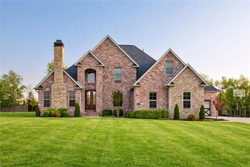 Welcome to this stunning executive-style home, perfectly situated on a generous lot in a highly sought-after neighborhood. An inviting 2-story foyer leads to the living room w/ vaulted ceilings, fireplace & custom entertainment center. The updated gourmet kitchen features a 48-inch built-in refrigerator, a built-in ice maker & beautiful waterfall island. The primary suite is a true retreat with a tiled shower, soaking tub, & ultra-custom walk-in closet that leads to a private patio. Step outside to a backyard oasis featuring a stunning heated pool w/ Ecosmarte system. This home also includes a home theater room, bonus room, office/den w/ fireplace & built-in bookshelves, formal dining room, security system, central vac, & sprinkler system. All showers in the home are custom tile. New roof with upgraded shingles in 2023. This home is conveniently located near the amenities of Siloam Springs. Don’t miss this rare opportunity to enjoy refined living and modern upgrades in an exceptional location.