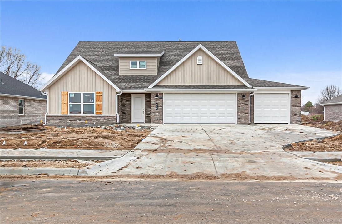 Excellent new construction in the beautiful Snyder Grove subdivision of Prairie Grove. This plan offers 2 levels with the main suite on the main level and 3 spacious bedrooms and a full bath upstairs. You will find a corner gas log fireplace in the spacious living room, a dining space that sits between the living and dining, and a gorgeous kitchen with gas range, stainless appliances, pantry, and island. Large covered back patio. Main suite with separate vanities, walk in shower, and walk in closet. Incredible price point for these finishes, amenities, and location.