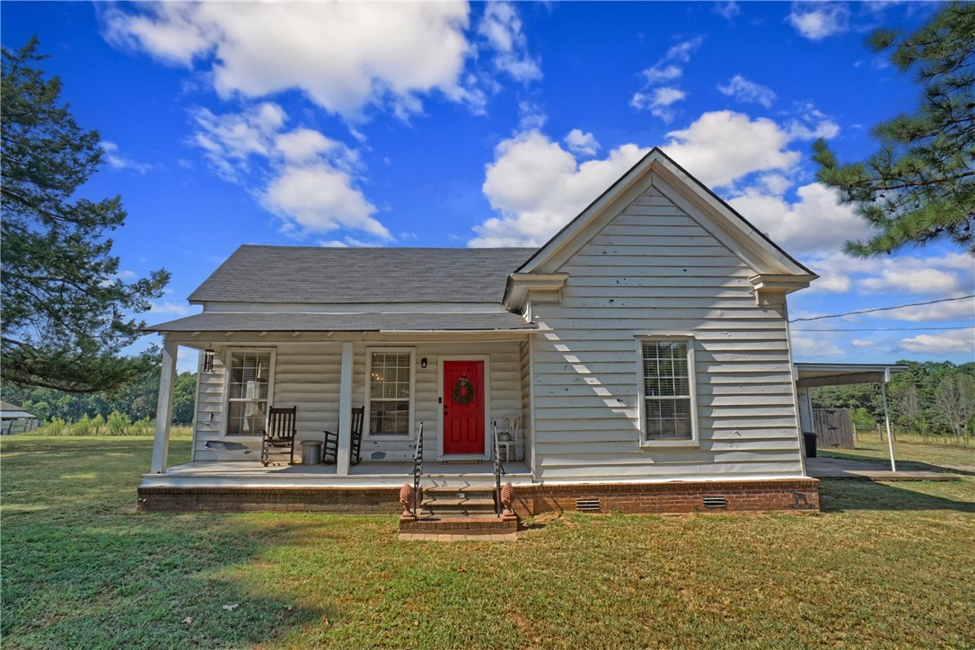 It is so hard to find a nice home in the country with and acre of land that won't break your budget at least until today. This one is located in Yell county at the foot of Mt Nebo. It has a huge yard with a privacy fence. Inside there are 3 large bedrooms, two full baths and a large living room. The heat and air was replaced in January 2025 and the new roof was completed in 2023 making this one move in ready. It has been a long time since a house like this came up for sale, don't put it off. Take a look today