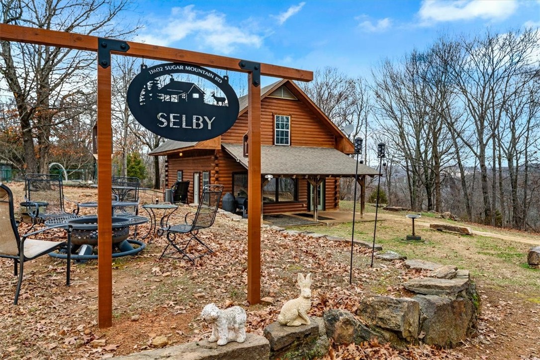 Don't miss the chance to own this one-of-a-kind property! The beautiful cabin is nestled on 133 acres, featuring a fully stocked pond, abundance of wildlife including deer and turkey. The cabin itself is 3 bedrooms 1 and 1/2 bath, crafted entirely from logs, and has a covered front porch for watching all the wildlife. The property itself has ample room for farm animals and multiple already established raised garden beds. Other features include a metal shop, rv storage with 220 amp service, as well as an additional storage building for wood or supplies it also has electric. This property is also listed as a cabin and 25 Acres MLS#1302634