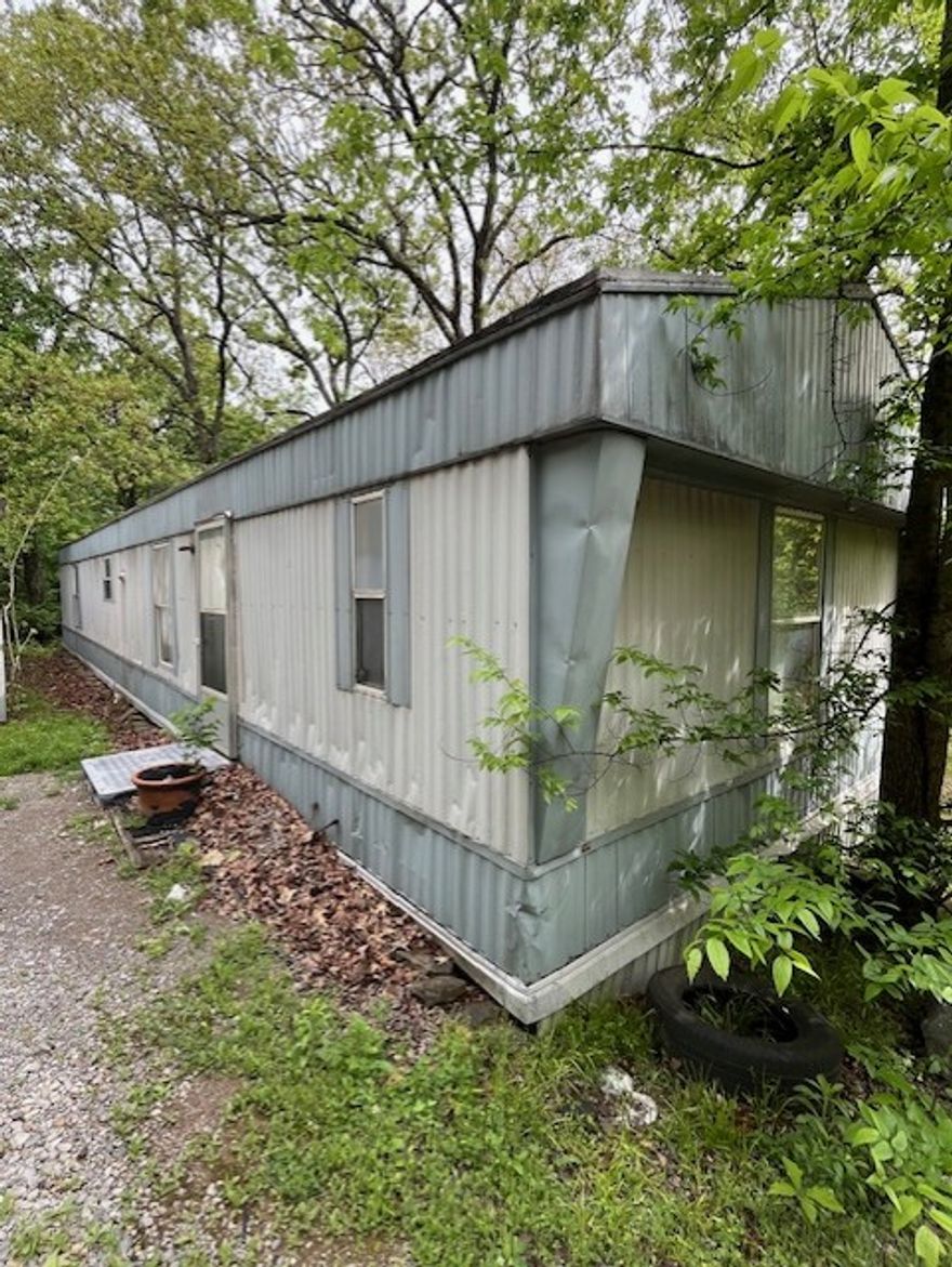 A good property for homeowners or investors.  The main mobile home is very livable and perfect for someone wanting something at an affordable price to live in.  Would make a very good rental.  There is a second mobile home that needs work to be livable, but could be second home or rental.