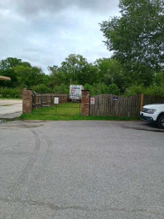 Enjoy the advantages of a downtown Springdale location with this flat lot, designated Neighborhood Center Type 2 (NC2). While single-family homes are not permitted under this zoning, there are numerous development options, including multi-family dwellings like duplexes and triplexes. Water easement and easement to access the property has been approved.