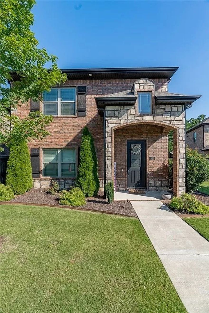Discover prime Fayetteville living at 529 N Salem Rd! This gorgeous 3-bed, 2.5-bath home (1,876 sqft) boasts an unbeatable location near the University of Arkansas, I-49, shopping, dining gym & trails. Enjoy low-maintenance luxury w/ HOA covering all lawn care & landscaping while you enjoy the wonderful community pool! Stunning open floor plan, primary suite & half bath on main level, spacious closets, upgraded kitchen w/ stainless appliances (including refrigerator, washer and dryer!), breakfast bar & pantry. Ideal side patio for entertaining, ample attic storage & rear-load 2-car garage. Perfect as a low-maintenance home or investment—move-in ready charm! Dont miss out on this wonderful opportunity today!